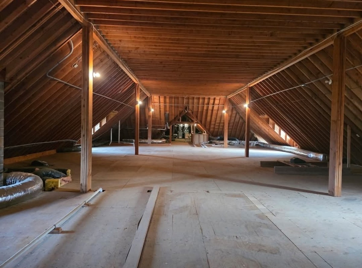 Wide view of a large attic and its roof structure